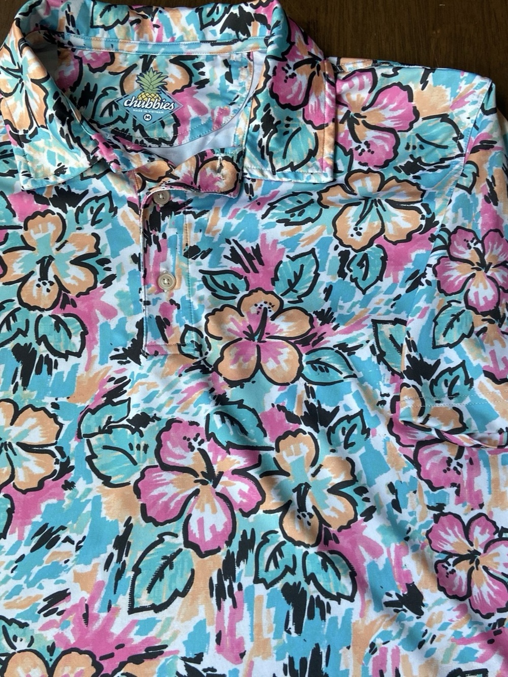 Chubbies Polo Shirt Mens Medium Blue Pink Floral Hawaiian Performance Stretch